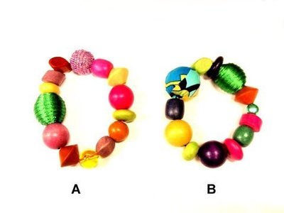 Pulsera elástica madera/tela Bolas