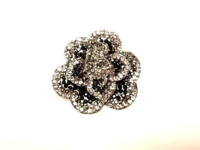 Broche acero/cristal swarovski flor  7021
